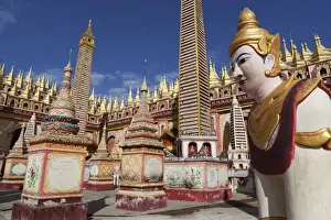 Monywa Prints: Thanboddhay Paya (pagoda) decorated with mini Buddha images and gilt mini-stupas