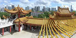 Events Prints: Thean Hou Temple to the Goddess Mazu with yellow chines lanterns and Kuala Lumpur skyline