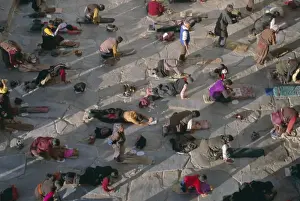 Meditating Prints: Tibetan Buddhist pilgrims prostrating outside the Jokhang Temple, Lhasa