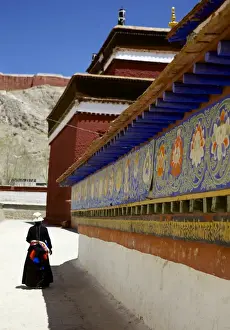 Chortens Prints: Tibetan Pilgrim circling the base of Kumbum chorten (Stupa) in the Palcho Monastery at Gyantse