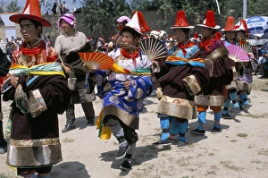 Tibetans dressed for religious shamans ceremony, Tongren, Qinghai Province