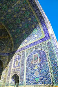 Typically Iranian Prints: Tiled archway in Isfahan blue, Imam Mosque, UNESCO World Heritage Site, Isfahan, Iran