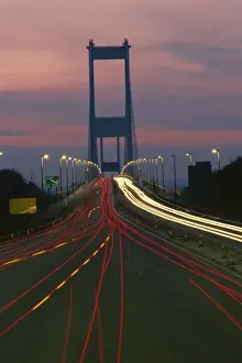 Tail Lights Prints: Time-lapsed view of traffic crossing the First (Old) Severn Bridge, Avon