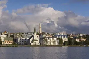 Tjorn Prints: The tin-clad Frikirkjan i Reykjavik church and Hallgrimskirkja