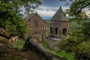 Attractions Prints: Tiri monastery exhibits ancient architecture in a natural setting above South Ossetia under cloudy skies