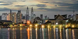 Early Prints: Titiwangsa Lake Garden and Kuala Lumpur city skyline at dawn, Malaysia, Asia