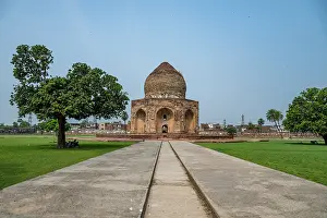 Footpath Prints: Tomb of Asif Khan stands in Lahore, a historic site surrounded by green lawn and clear sky