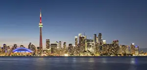 Nighttime Prints: Toronto skyline featuring the CN Tower at night across Lake Ontario