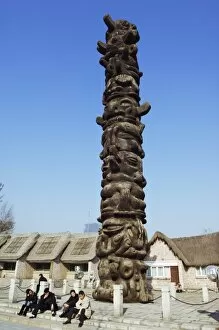 Images Dated 20th November 2007: A totem pole at the cultural village in the Olympic Park area, Beijing, China, Asia