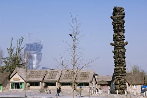 Images Dated 20th November 2007: A totem pole at the cultural village in the Olympic Park area, Beijing, China, Asia