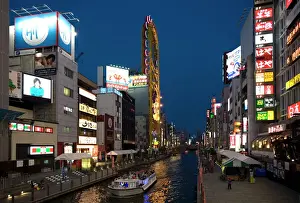 Osaka Prints: Tour boat on Dotonbori River glides past shops and restaurants in Namba