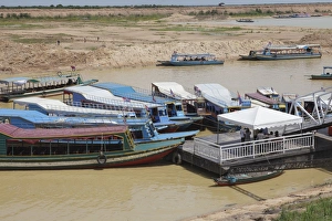 Passenger Boat Prints: Tour boats docked at a jetty, Tonle Sap, Cambodia, Indochina, Southeast Asia, Asia