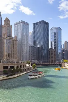 River Cruise Prints: Tourist boat on the Chicago River with glass towers behind on West Wacker Drive