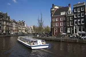 Images Dated 9th April 2008: Tourist boat at the Golden Bend on the Herengracht canal, Amsterdam, Netherlands, Europe