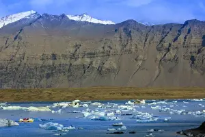 Jokulsarlon Prints: Tourist boat in icebergs in the Jokulsarlon glacial lake in Vatnajokull National