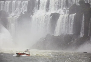 Tourist boat at Iguazu Falls, Iguazu National Park, UNESCO World Heritage Site, Misiones, Argentina, South America