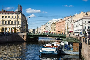 Tourist boat on a water channel in the center of St. Petersburg, Russia, Europe