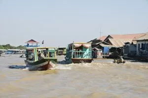 Tourist boats, Tonle Sap Lake, near Siem Reap, Cambodia, Indochina, Southeast Asia, Asia