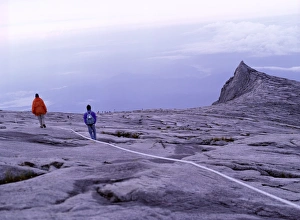 Climber Prints: Tourist climbers follow guide ropes towards Lows Peak
