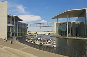 River Spree Prints: Tourist cruise boat on the river Spree passing the Marie-Elizabeth-Luders Haus