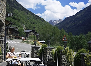 Andorra Prints: Tourist drinking beer in roadside bar, Llorts, Parish of Ordino, Ordino Valley