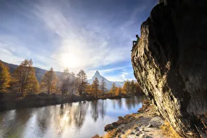 One Young Man Only Prints: One tourist looks Matterhorn at Grindjisee Lake. Zermatt, Mattertal, Canton of Valais