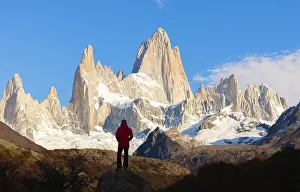 Mountainscape Prints: A tourist observes Fitz Roy mountain during sunrise