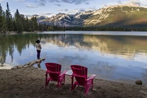 Contemplating Gallery: Tourist and Red Chairs by Lake Edith, Jasper National Park, UNESCO World Heritage Site