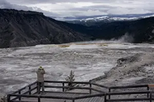 Mother Nature Prints: Tourist viewing geysers, Yellowstone National Park, UNESCO World Heritage Site