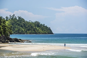 West Sumatra Prints: Tourist walking on Sungai Pinang Beach