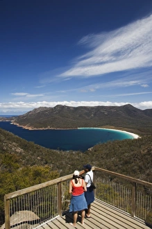 Couple Prints: Tourists admiring the view of Wineglass Bay