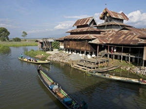 Shan State Prints: Tourists arrive by boat at monastery on Inle Lake, Shan State, Myanmar (Burma), Asia