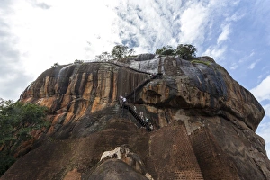 Rock Face Prints: Tourists ascending Sigiriya (Lion Rock), UNESCO World Heritage Site, Sri Lanka, Asia