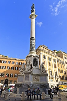 Squares Prints: Tourists take a break beneath a column, Rome, Lazio, Italy, Europe