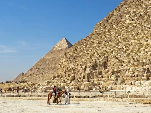 Tour Guide Prints: Tourists on camel ride in front of the Great Pyramid of Giza