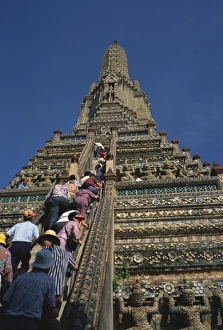 Wat Arun Prints: Tourists climb the steps of Wat Arun (Temple of the Dawn)
