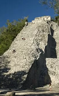 Tourists climbing the stairway, Nohoch Mul (Big Mound), Coba, Quintana Roo
