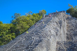 Traditionally Mexican Prints: Tourists climbing the temple, Nohoch Mul Temple, Coba, Quintana Roo, Mexico, North