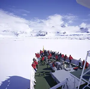 Sea Ice Prints: Tourists on deck of a cruise ship, sea ice cruising in fast ice, Antarctic Peninsula