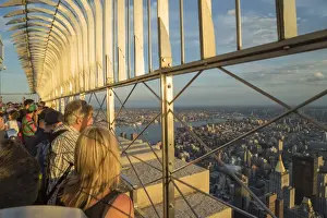 Viewing Platform Prints: Tourists at the Empire State Building viewing platform enjoying the view