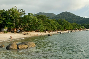Tourists enjoying Nipah Beach at sunset time