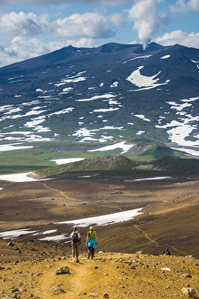 Tourists hiking to the smoking Gorely volcano, Kamchatka, Russia, Eurasia