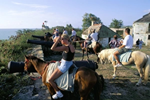 Leeward Island Prints: Tourists on horseback in historic Fort James, St