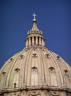 Tourists between the lantern and dome of St