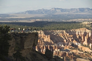 Bryce Canyon Prints: Tourists looking out over the Bryce Canyon National Park