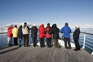 Tourists looking at ice in the Antarctic Sound, Antarctic Peninsula, Antarctica