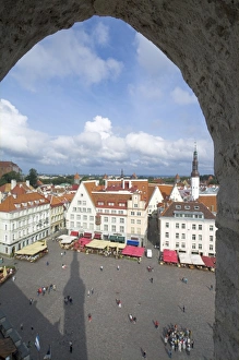 Tourists in the Old Town square with cafe canopies, Tallinn, Estonia, Baltic States