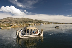 Float Prints: Tourists on reed boat and the floating islands of the Uros people, Lake Titicaca