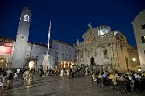 Tourists sitting in cafes at night time in Dubrovnik, Croatia, Europe