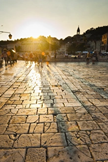Hvar Island Prints: Tourists in St. Stephens Square at sunset